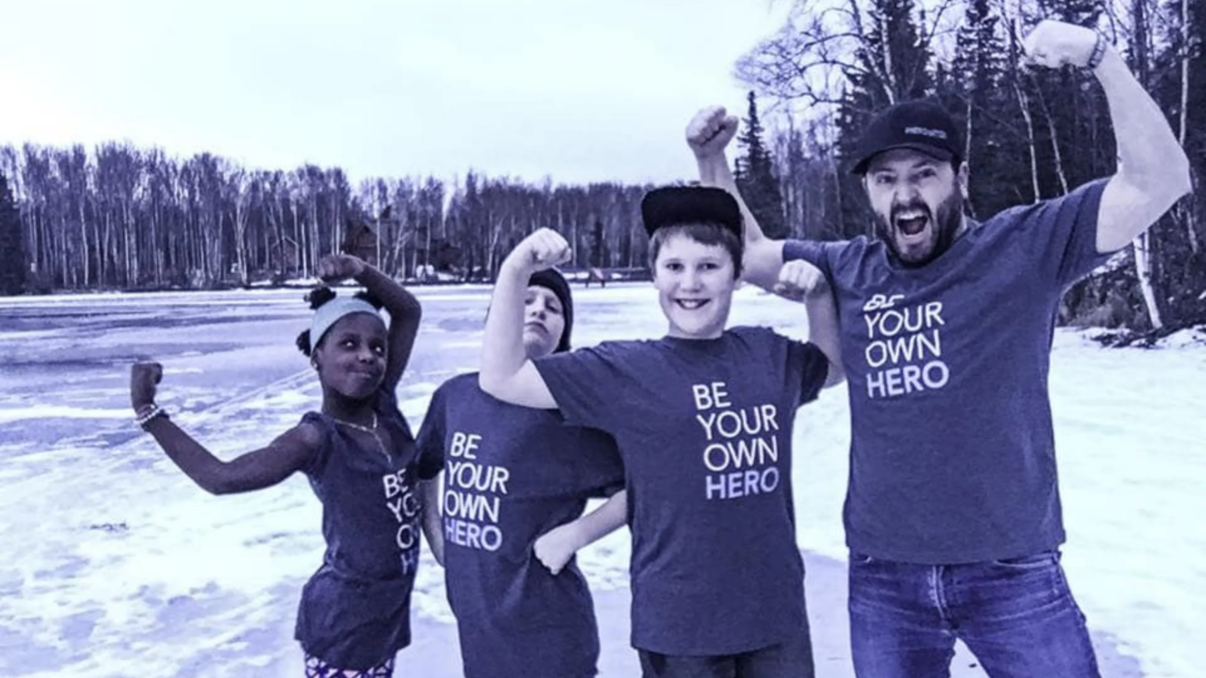 Children wearing Be Your Own Hero shirts